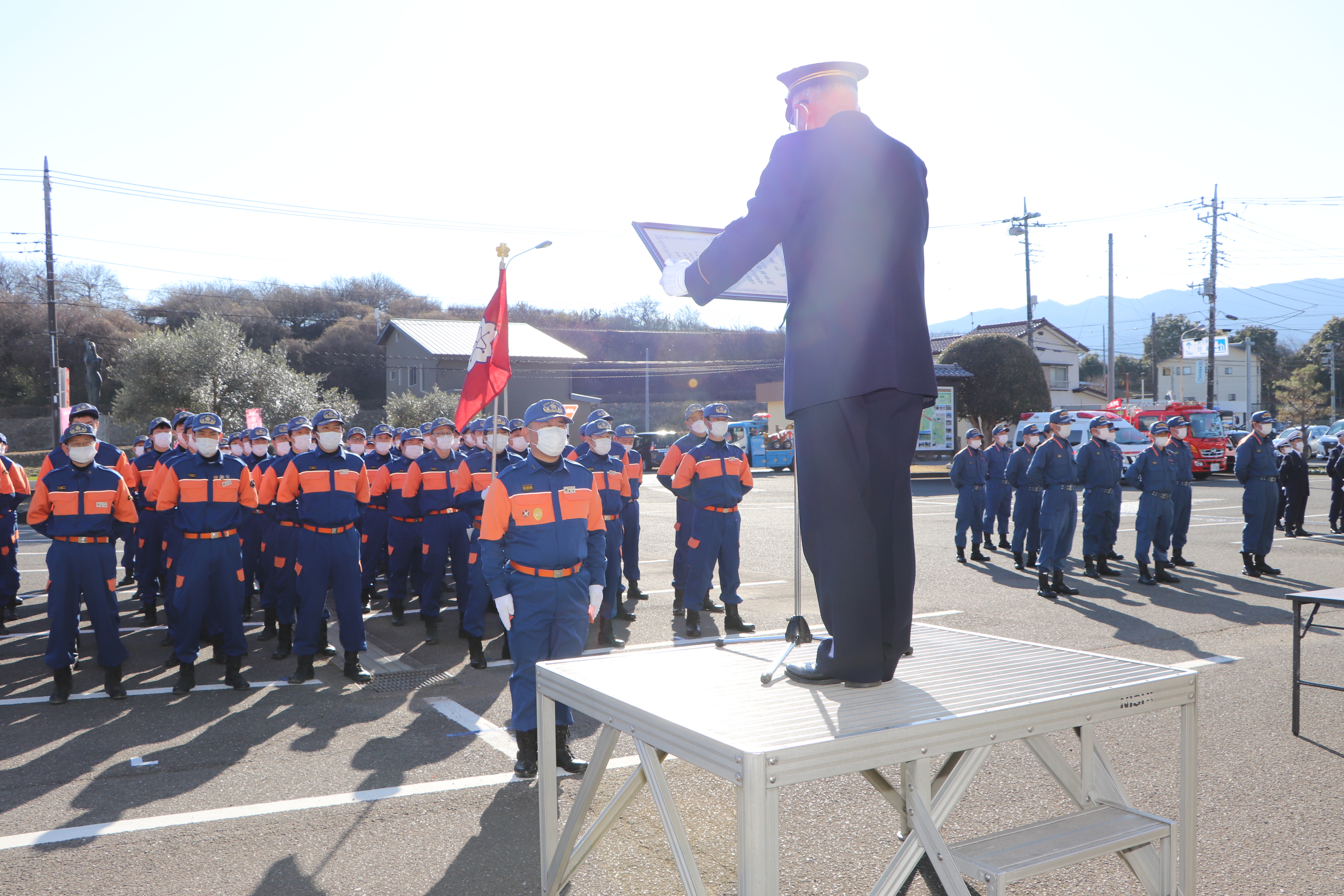 表彰式が挙行されました（精績章表彰：峯岸団長（中央））